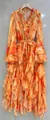 Close-up of floral maxi dress featuring rhinestone V-neck and ruffled layered hemline. - S / Top And Bottom / Orange