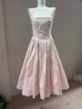 Front view of a pale pink halter-neck pleated dress displayed on a mannequin. - S / Top And Bottom / Pink