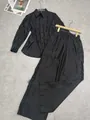 Elegante zwarte set met opengewerkte kanten blouse en broek met wijde pijpen - S / Top En Bottom / Zwart