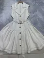 Sleeveless white denim dress featuring a shirt collar, waist belt, and gold buttons - S / Short Style (Bottom) / White