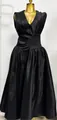 Detailed view of an elegant black sleeveless V-neck pleated waist French style long dress - Black