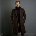 Elegant men's mid-length brown wool coat over black turtleneck in studio setting. - S / Tops / Dark Brown