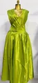Detailed view of the elegant lime green pleated French style long dress on a mannequin - S / Top And Bottom / Green