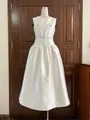 Elegante abito midi bianco senza maniche in stile francese con tasche e cintura - Bianco