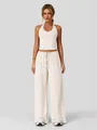 Women's comfortable beige two-piece lounge set featuring a halter top and wide-leg pants - S / Top And Bottom / Apricot