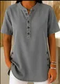 Detail view of grey denim short sleeve top with buttoned collar and side accents - S / Tops / Gray