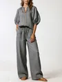Casual grey two-piece set with puff sleeve zipper top and wide-leg drawstring pants - Gray
