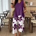Elegant two-piece set with purple sleeveless V-neck top and floral wide-leg cropped pants. - S / Top And Bottom (WYH001) / Purple