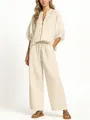Elegant women's beige casual two-piece set featuring a zip-up top and wide-leg pants - S / Top And Bottom / Apricot