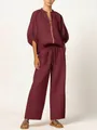 Elegant burgundy two-piece set featuring zip-up puff sleeve top and wide-leg pants - S / Top And Bottom / Burgundy