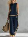 Elegante conjunto de dos piezas sin mangas azul marino y amarillo con pantalones de pata ancha. - S / Top Y Pantalón / Azul marino