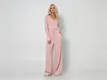 Detailed view of pink ribbed knit loungewear set featuring long sleeves and wide-leg pants - S / Top And Bottom / Pink