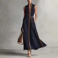 Full-length view of an elegant sleeveless navy maxi dress with brown contrast trim - Dark Blue