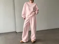 Comodo set da casa due pezzi rosa pallido con felpa oversize e pantaloni sportivi larghi - Rosa