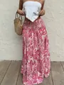 Dettaglio di gonna lunga con stampa paisley rosa, vita elastica e orlo a balze - Taglia S / Pantaloni e gonne / Rosa