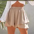 Detailed view of women's beige high-waisted ruffled shorts with elastic waist - S / Bottom (KG531) / Khaki