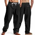 Detailed view of men's loose linen straight-leg pants with front and back design - S / Bottoms / Black