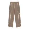 Détail du pantalon de sport droit kaki pour hommes avec boutons-pression et rayures latérales - Beige