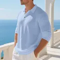Close-up detail of light blue breathable linen-cotton long sleeve polo shirt for men. - Light Blue