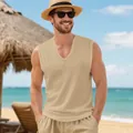 Detailed lifestyle view of men's beige V-neck quick-dry muscle sports tank top on beach - Khaki