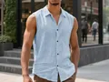 Close-up of light blue sleeveless linen shirt showing breathable fabric texture and buttons - Sky Blue