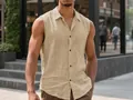 Close-up of a men's casual sleeveless linen shirt featuring a lapel and chest pocket - S / Tops / Khaki