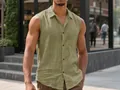 Close-up of men's sleeveless olive linen shirt with lapel and button detail. - Army Green