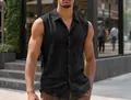 Close-up of black sleeveless collared shirt showing linen texture and button details - S / Tops / Black