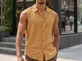 Detailed view of yellow linen sleeveless shirt with button-down collar and chest pocket - Caramel color