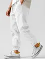 Men's breathable white cotton linen joggers with elastic waist and drawstring detail. - S / Bottoms / White