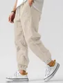 Breathable men's linen casual joggers in beige with drawstring waist and elastic cuffs. - S / Bottoms / Khaki