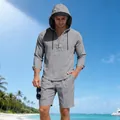 Vista dettagliata del set da spiaggia in lino grigio con camicia con cappuccio e pantaloncini. - Taglia S / Top E Pantaloni / Grigio