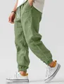 Men's breathable olive green linen joggers with drawstring waist and elastic cuffs - S / Bottoms / Army Green