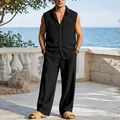 Vista a figura intera di un uomo che indossa camicia di lino nera senza maniche e pantaloni ampi - Taglia S / Top e Pantaloni / Nero