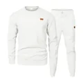 Elegant white men's two-piece sports leisure suit featuring textured jacquard knit pattern - White