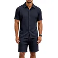 Vue détaillée de la texture du tissu de cet ensemble jacquard bleu marine pour homme. - Bleu marine
