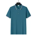 Polo de golf à manches courtes bleu sarcelle pour hommes avec col et poignets rayés chic - Aqua
