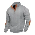 Macro detail of men's grey cable knit sweater featuring orange contrast elbow patches - Light Gray