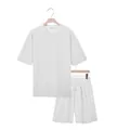 Detailed view of men's two-piece set featuring white checkerboard textured fabric - S / Top And Bottom / White