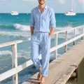 Full body view of light blue men's linen shirt and pants set on a sunny beach pier - Light Blue