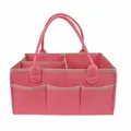 Vista detallada de una bolsa organizadora de pañales de fieltro rosa con compartimentos - Ribete rosa Estilo(20) / 33x23x18cm / Rosa