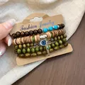 Vintage ethnic style wood and coconut shell beaded bracelet set with Evil Eye charm - Evil Eye / Five-Piece Set / Brown-Green
