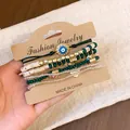 Vintage ethnic style green and gold beaded bracelet 6-piece set with evil eye charm - Evil Eye / 6-Piece Set / Green