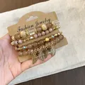 Vintage bohemian beaded bracelet set with gold leaf charms in brown and gold tones - Leaf / Four-Piece Set / Gold-Light Coffee