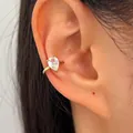 Elegant gold twisted ear cuff featuring a clear waterdrop zircon for non-pierced ears - Right Ear (1 Piece) / Gold