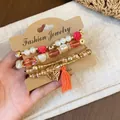 Retro ethnic style multi-layer beaded bracelet set with orange tassel and golden leaf charm - Rose / Four-Piece Set / Gold-Rose Red