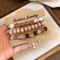 Vintage 3-piece beaded bracelet set with tree of life charm in warm earthy earth tones - Tree of Life / Three-Piece Set / Light Coffee