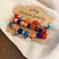 Vintage ethnic style beaded bracelet set with charms like wing, elephant and heart. - Feather / Three-Piece Set / Silver - Rainbow
