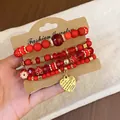 Retro ethnic style red beaded bracelet set with gold heart charm on display card - Heart / Four-Piece Set / Gold-Red