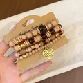 Handmade vintage ethnic style 6-piece wooden bead bracelet set with heart charm - Heart / Four-Piece Set / Gold - Champagne